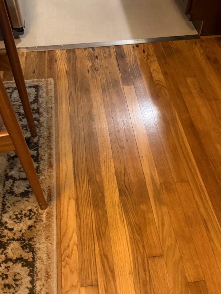 A picture showing how squeaky wood floors can be repaired. 