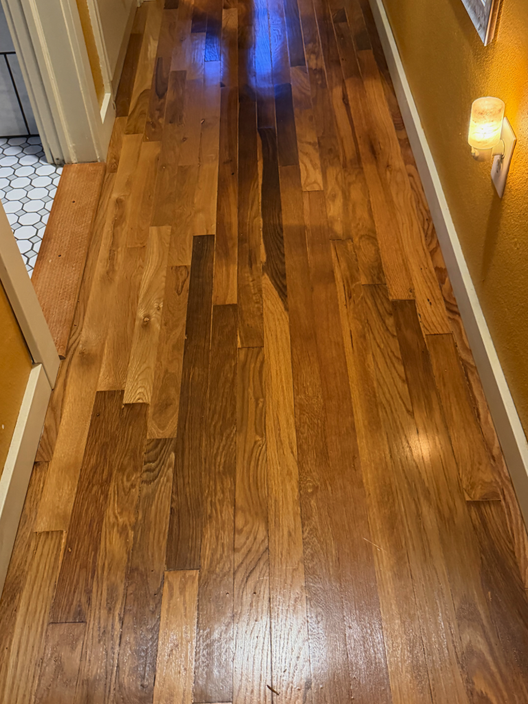 A squeaky wood floor that has been repaired. 